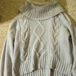 American Eagle. Women’s medium. Turtleneck sweater. Light blue. Good condition.